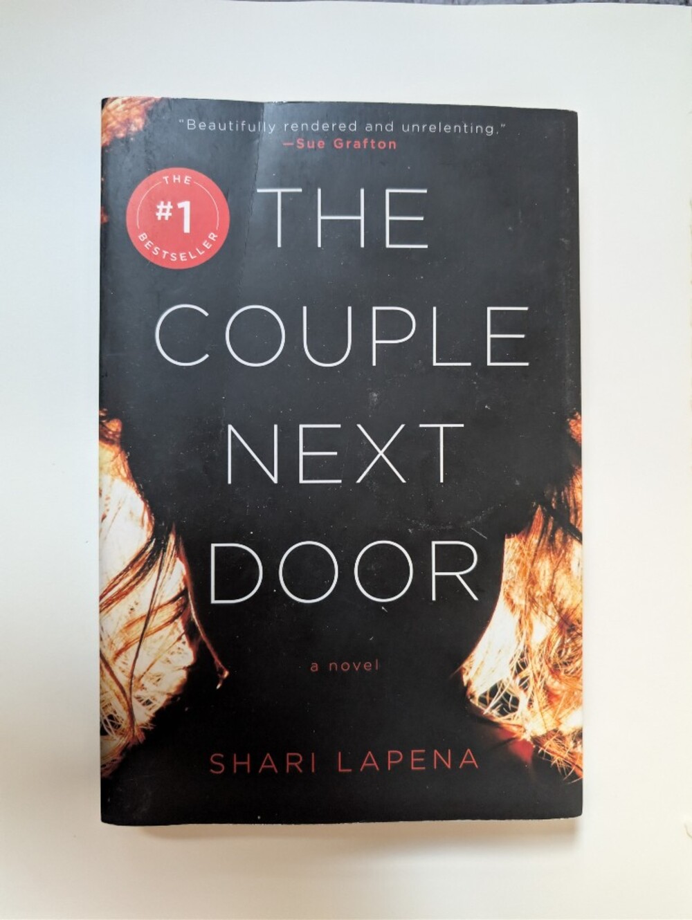 The Couple Next Door By Shari Lapena—  Paperback Book